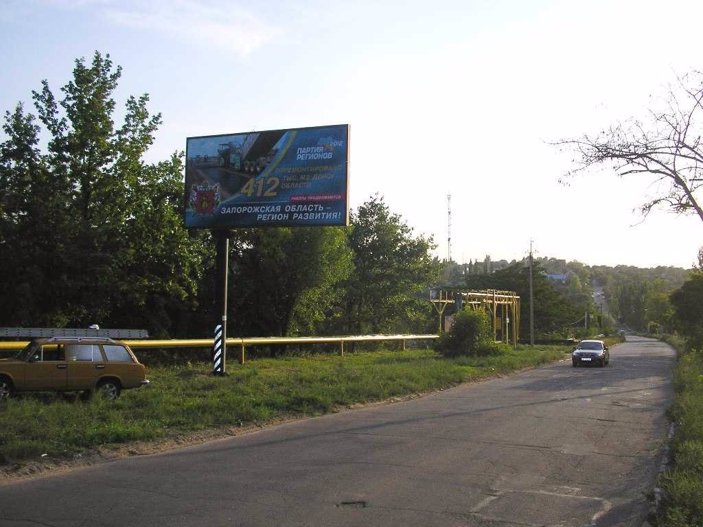 `Билборд №2635 в городе Днепрорудное (Запорожская область), размещение наружной рекламы, IDMedia-аренда по самым низким ценам!`