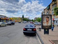 Сітілайт у місті Васильків #268436 за адресою м. Васильків, вул. Грушевського, 6, біля відділення ПУМБ, навпроти автобусної зупинки, за 50м до Васильківського Міськрайонного центру зайнятості, за 100м до магазину "Сільпо" та "COMFY", за 200м до повороту на вул. Гоголя, за 250м до повороту на вул. Декабристів, через 150м після магазину "АТБ-Маркет" Сітілайт №268436 в місті Васильків (Київська область), розміщення зовнішнішньої реклами, IDMedia-оренда найнижчі ціни!