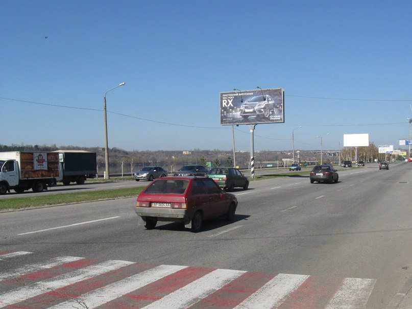 Билборд формат Призма 3x6 №99571 в городе Запорожье (Запорожская область) `Билборд №99571 в городе Запорожье (Запорожская область), размещение наружной рекламы, IDMedia-аренда по самым низким ценам!`